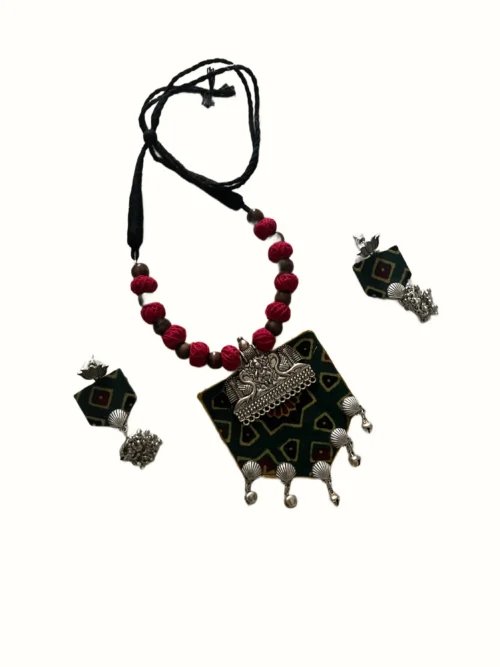 Handcrafted Dark Green Printed Fabric Necklace Set with Peacock Silver Motif, Red Fabric Beads & Shell Charm Earrings