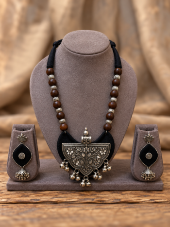 Handcrafted Black Fabric Crescent Necklace Set with Oxidized Silver Floral Carved Pendant & Lotus Earrings