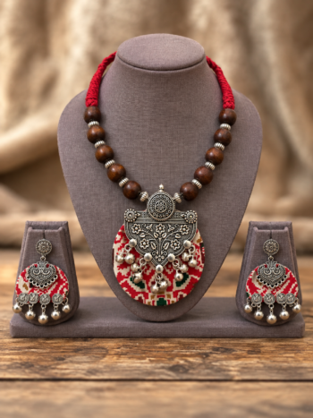 Handcrafted Red Ajrakh Fabric Pendant Necklace Set with Oxidized Silver Floral Charm & Wooden Beads
