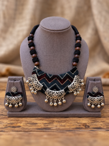 Handcrafted Black Chevron Ajrakh Fabric Crescent Necklace Set with Filigree Silver Accents, Wooden Beads & Ghungroo Earrings