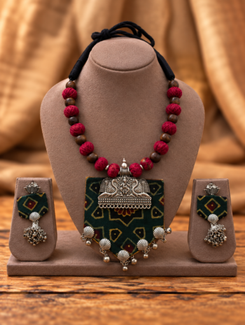 Handcrafted Dark Green Ajrakh Fabric Necklace Set with Peacock Silver Motif, Red Fabric Beads & Shell Charm Earrings