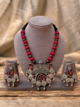 Handcrafted Maroon Kalamkari Ajrakh Fabric Necklace Set with Peacock Silver Crest, Coin Fringe & Fabric Bead Strand