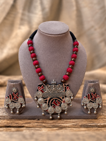 Handcrafted Maroon Kalamkari Ajrakh Fabric Necklace Set with Peacock Silver Crest, Coin Fringe & Fabric Bead Strand