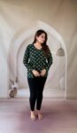 Bottle green Ajrakh cotton short kurti with yellow lotus buti and V-neck, full front view