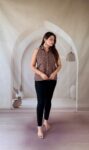 Brown Ajrakh cotton halter neck shirt kurti with red floral buti, full front view