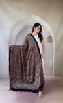 Charcoal grey Ajrakh modal silk dupatta with red floral creeper jaal and geometric palla