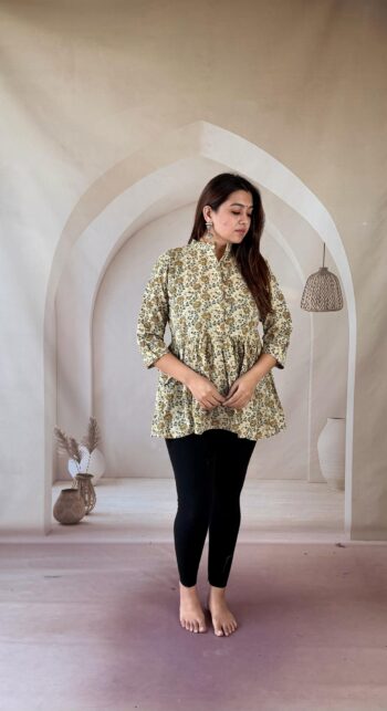 Cream Ajrakh cotton peplum short kurti with floral creeper and mandarin collar, full front view