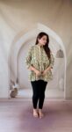 Cream Ajrakh cotton peplum short kurti with floral creeper and mandarin collar, full front view