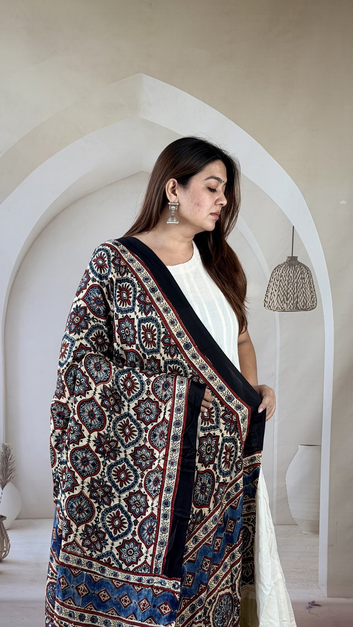 cream-maroon-ajrakh-modal silk-dupatta-star-medallion-3 Close-up of cream and maroon Ajrakh modal silk dupatta with indigo star medallion grid