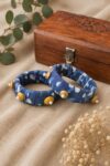Handcrafted indigo Ajrakh fabric bangles with mustard disc beads and pearls, set of 2