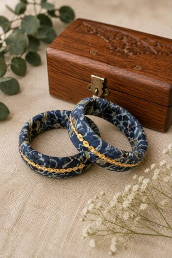 Handcrafted navy blue Ajrakh fabric bangles with golden sequin trim, set of 2